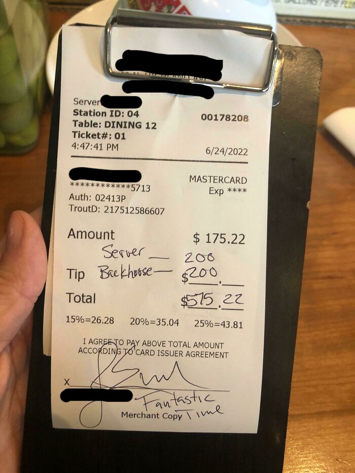 Receipt with $200 tip for server, showcasing experiences in the food service industry, handwritten note reads "Fantastic."