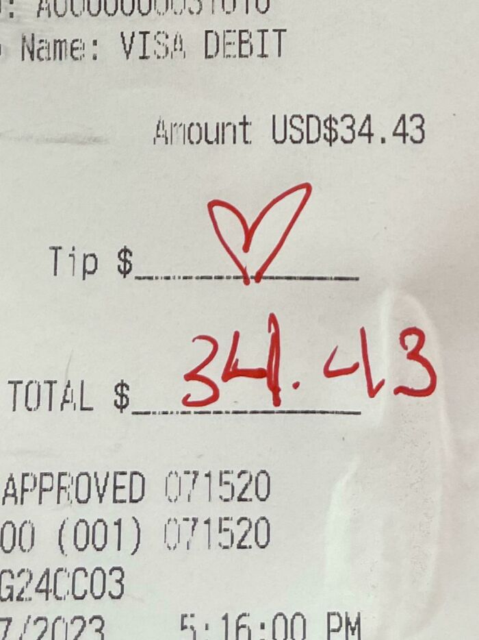 A receipt with a tip line filled with a heart symbol, illustrating mildly infuriating server tips.