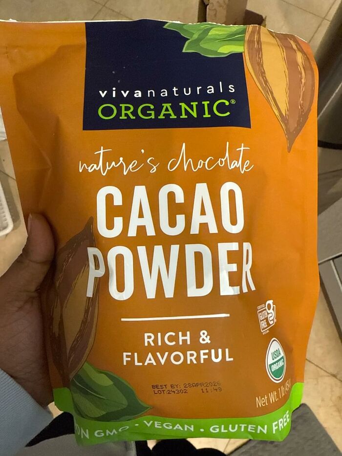 Bag of organic cacao powder labeled as rich and flavorful, ideal for old school beauty hacks.