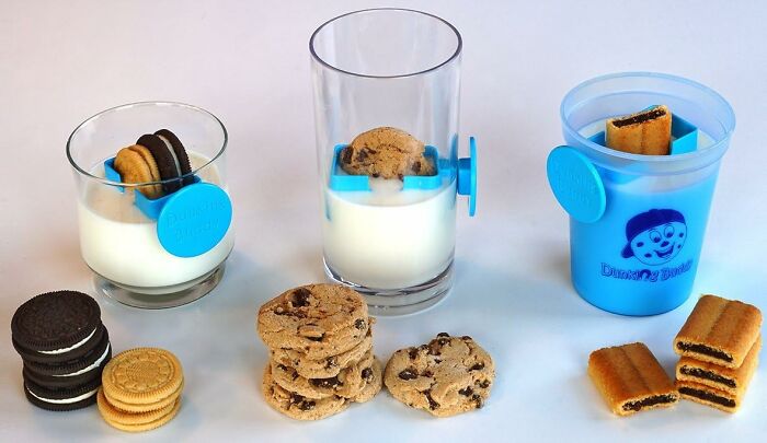 Clever inventions for dunking cookies in milk using blue holders.