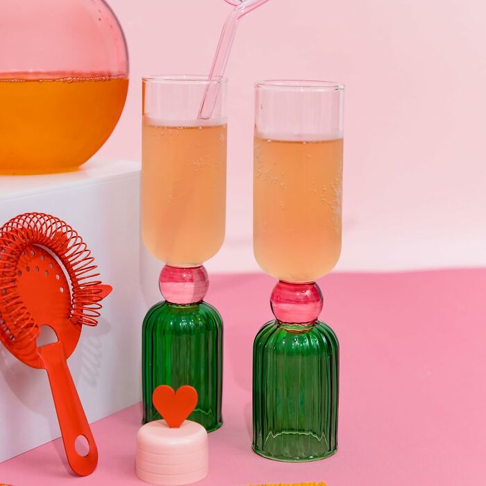 Bando products featuring colorful glasses and cute drink accessories on a pink background.