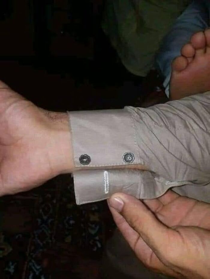 "Cuff sleeve with hand and foot in an unusual context, exemplifying weird images worth seeing."