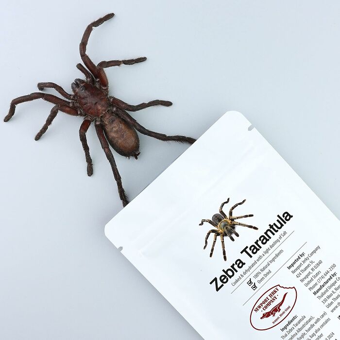 Snack package labeled "Zebra Tarantula" with a dried tarantula on top.