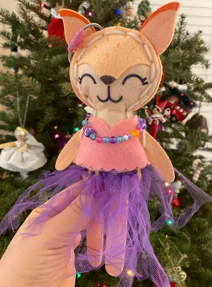 Plush fox doll with pink dress and purple tutu, perfect gift ideas for fun aunt or uncle.