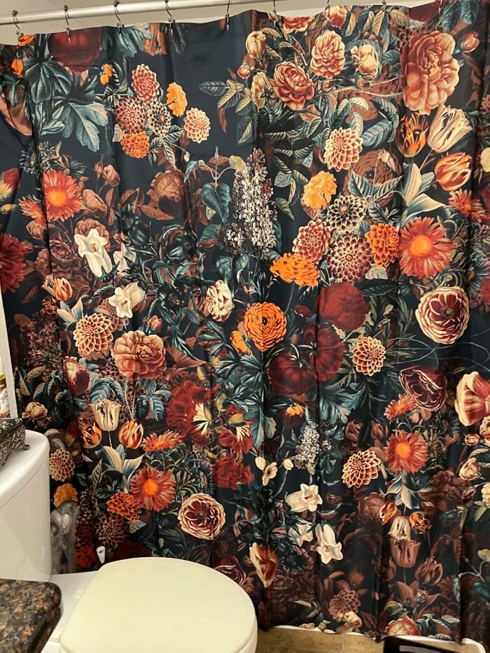 Floral shower curtain featuring vibrant designs from Society 6 in a bathroom setting.