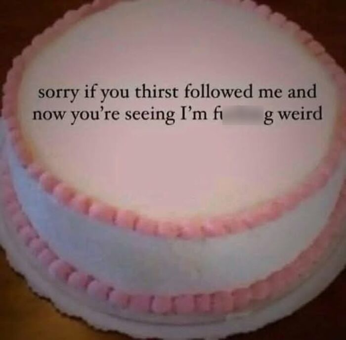 Cake with text humorously apologizing for being "weird" as part of mental health memes.