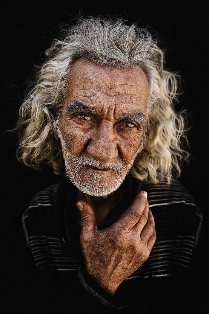 Expressive face of an elderly man, captured with striking detail by a skilled photographer.