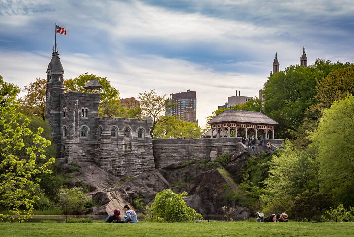 Stone castle-like structure in a park setting, showcasing beautiful yet possibly useless buildings.