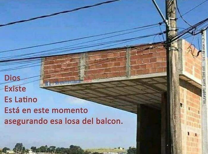 Brick structure with wires, showcasing an architecture fail with an unfinished balcony.