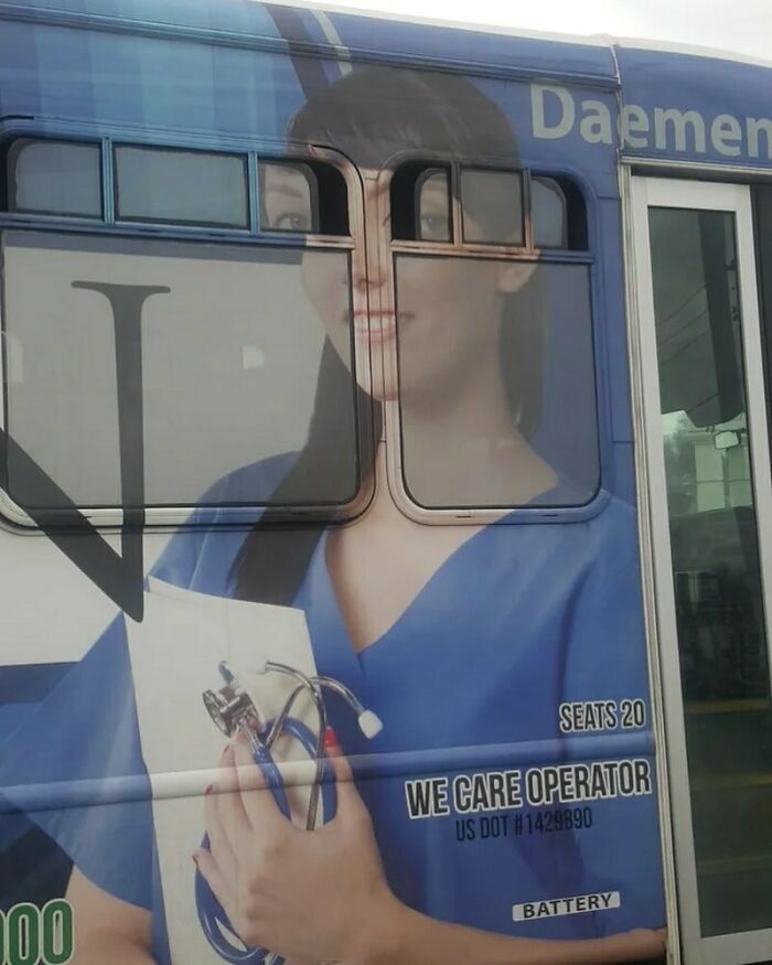 Bus ad design fail with misaligned windows distorting a nurse's face and body, making you wonder how did that happen.