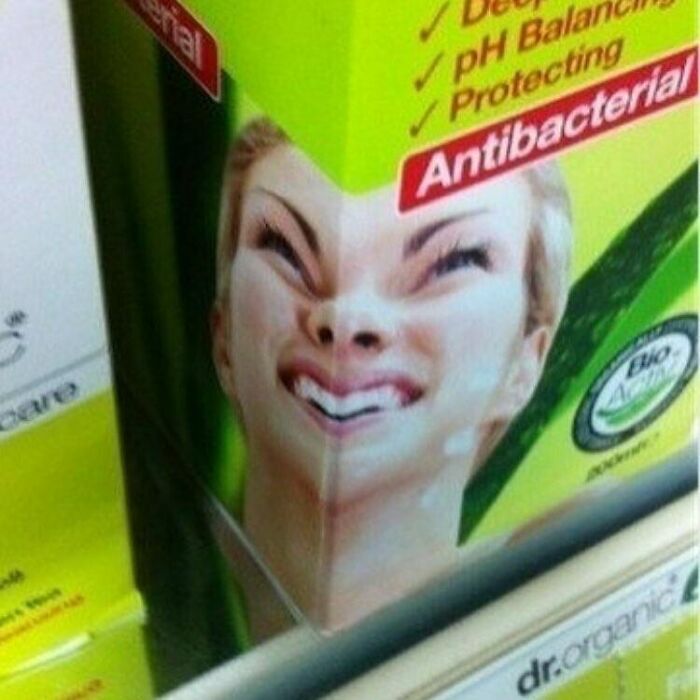 Antibacterial product with a distorted face design fail on packaging, creating a bizarre visual effect.