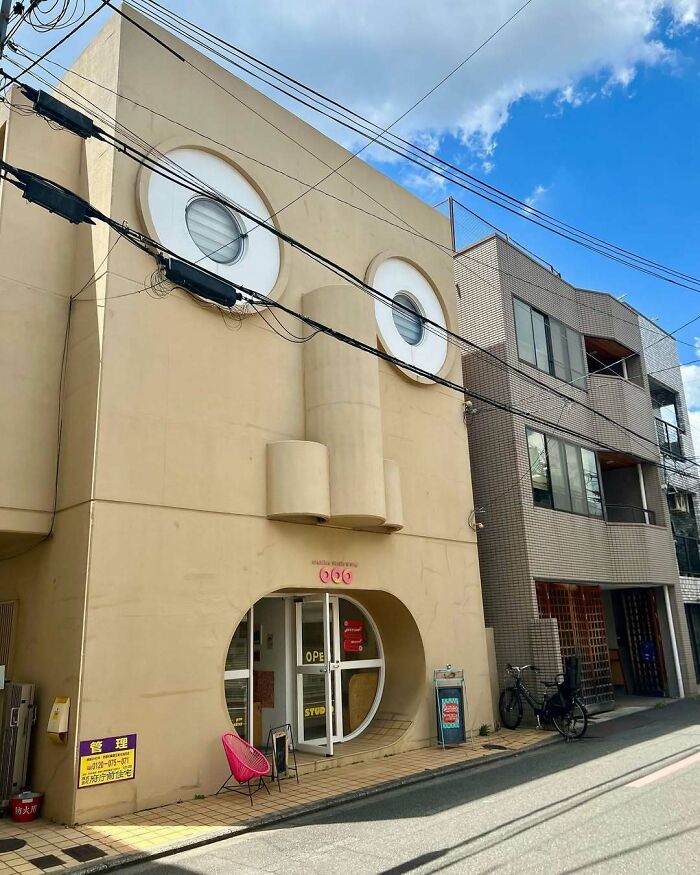 Unique building in Japan with windows resembling eyes for Interesting-Japan-Pics SEO.