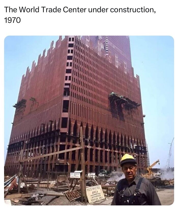 World Trade Center under construction in 1970, illustrating historical facts with a worker in a yellow hard hat.
