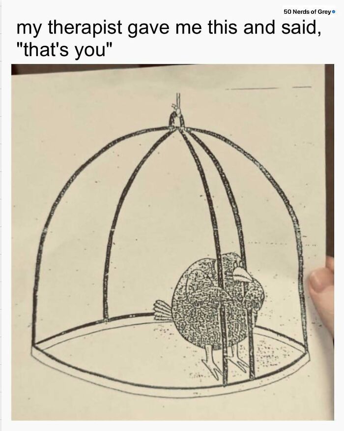 A cartoon bird inside a cage with text: "my therapist gave me this and said, 'that's you'." Nerds of Grey humor.