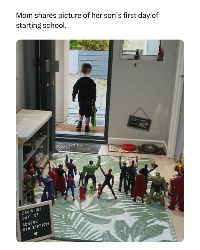 Child's first day of school with toy superheroes lined up, bringing joy and heartwarming vibes to the moment.