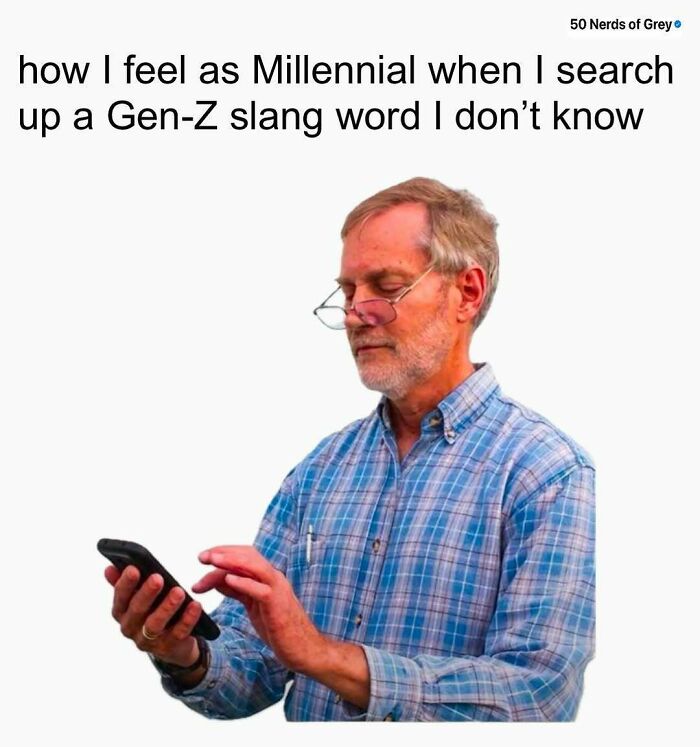 Elderly man in glasses using a phone, humorously capturing generational tech challenges, from "50 Nerds Of Grey" memes.
