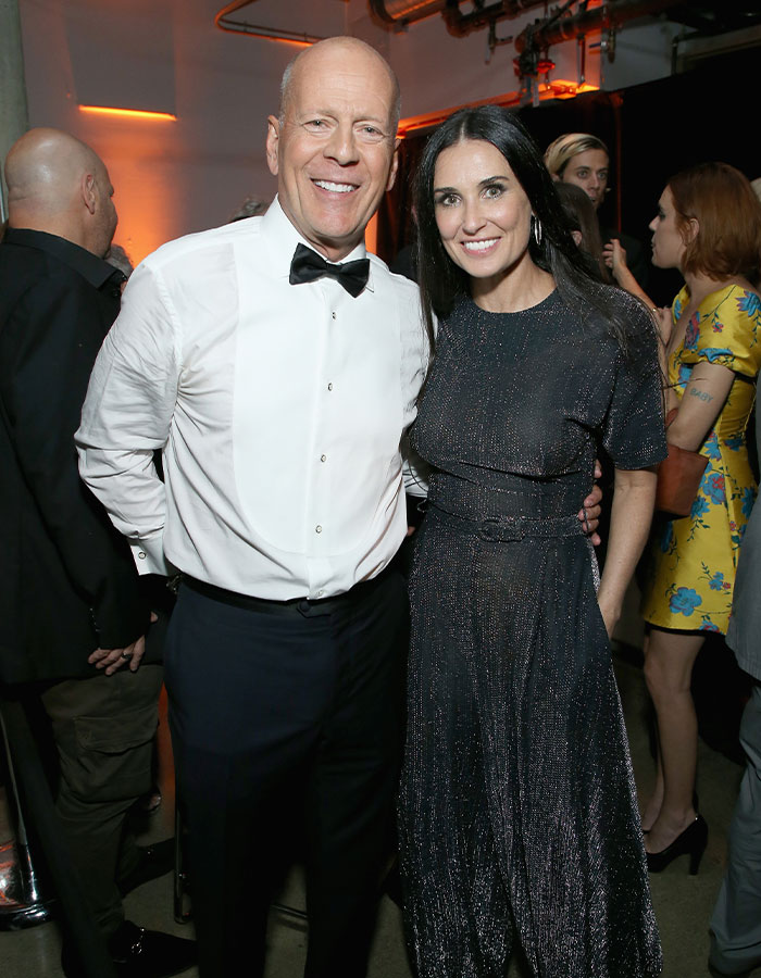 Demi Moore and Bruce Willis smiling together at an event, highlighting a heartfelt moment amid his dementia battle. Demi Moore and Bruce Willis smiling together at an event, highlighting a heartfelt moment amid his dementia battle.