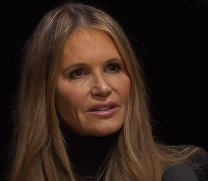 Woman with long hair, wearing a black top, in a close-up shot, related to Photoshop controversy. Woman with long hair, wearing a black top, in a close-up shot, related to Photoshop controversy.