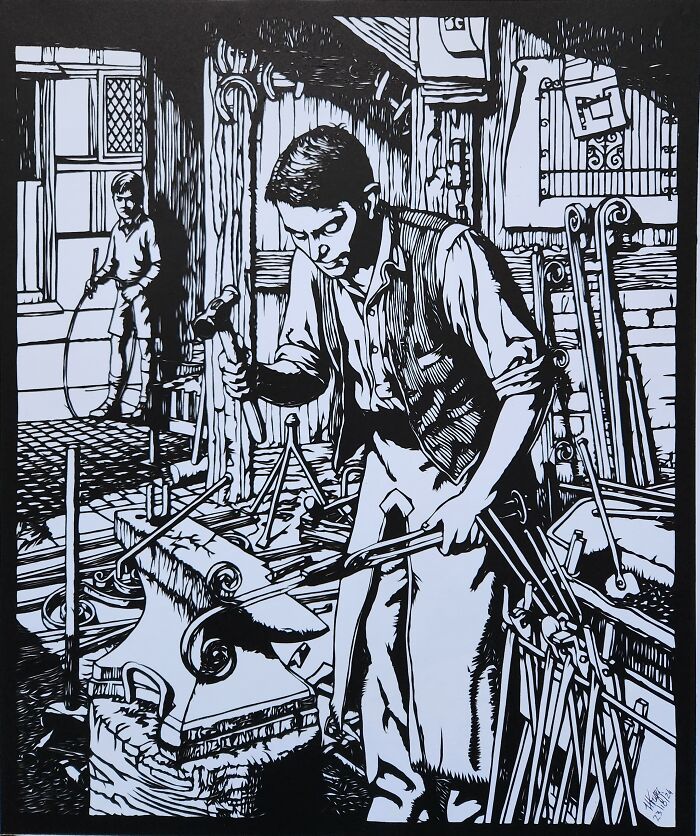 Hand-cut paper artwork of a blacksmith at work, detailed with intricate designs and a child playing in the background.