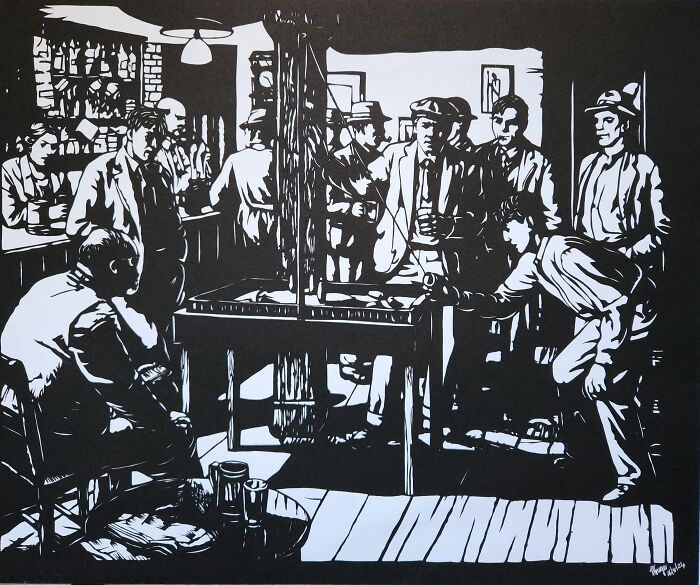 Intricate paper artwork depicting a lively bar scene, hand-cut using a scalpel, showing detailed figures and shadows.