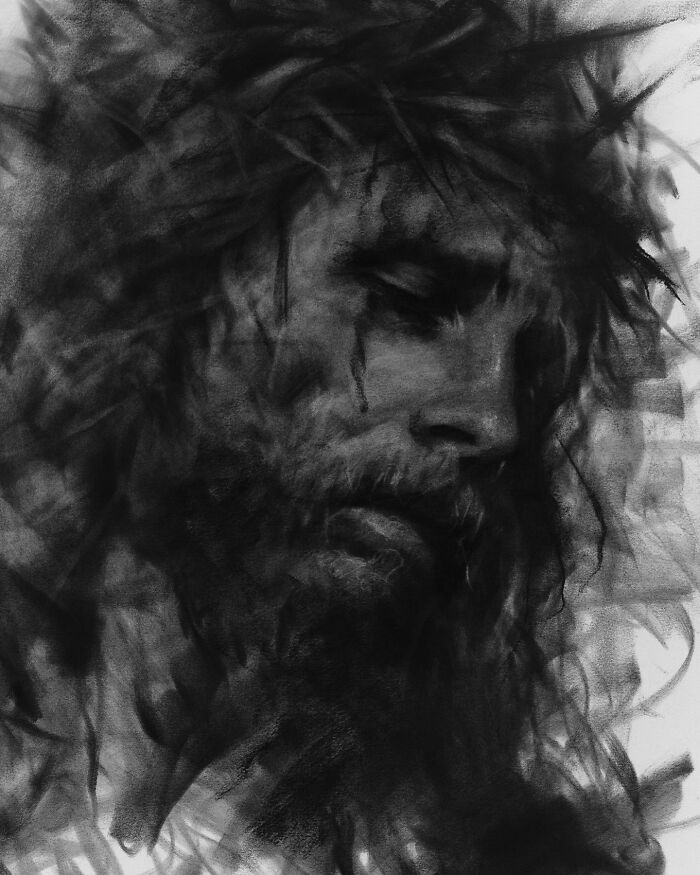 Charcoal portrait of a bearded man by artist Josh Hernandez, featuring expressive textures and deep shadows.