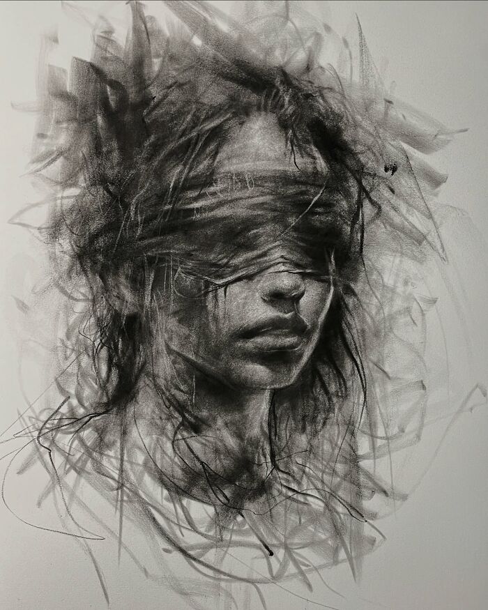 Charcoal portrait by Josh Hernandez, featuring a blurred face with dynamic lines creating a mysterious effect.