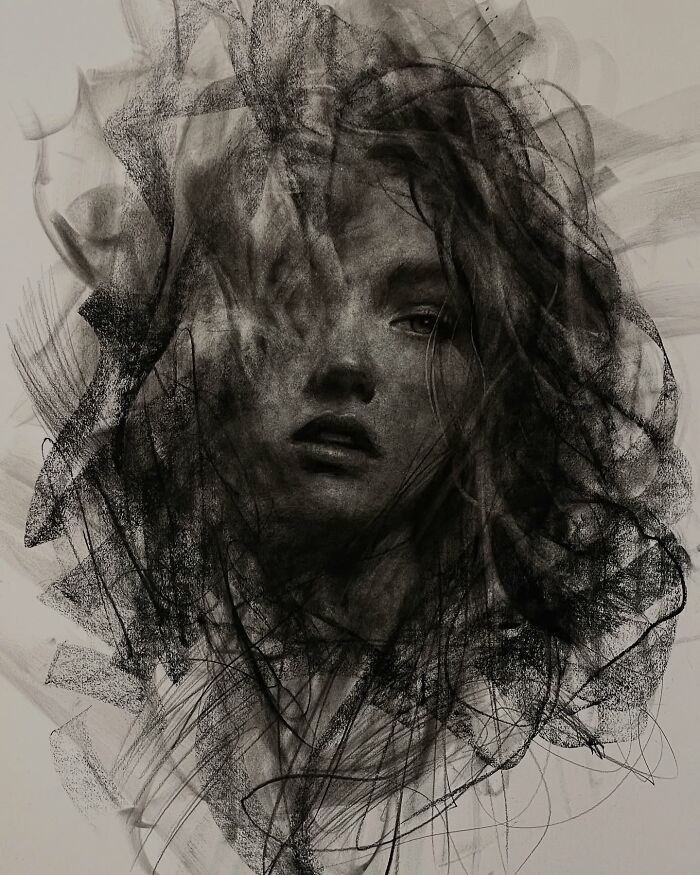 Charcoal portrait by artist, featuring an abstract, detailed depiction of a woman's face amid swirling textures.