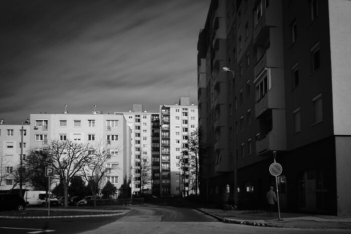 Hungary's panel buildings in black and white, showcasing geometric structure and urban landscape.