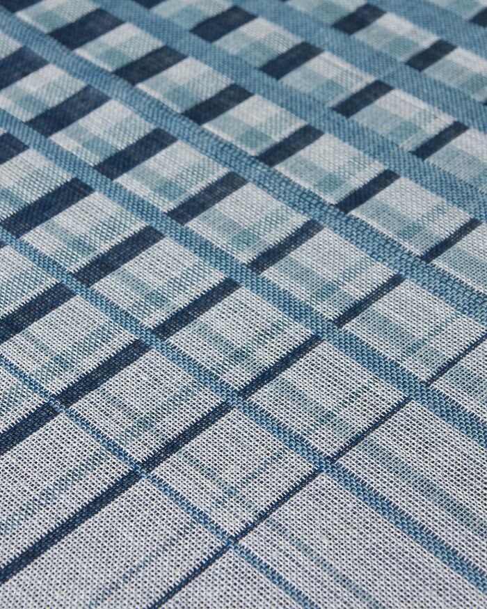 Intricate geometric weave art creating stunning optical illusions in shades of blue.