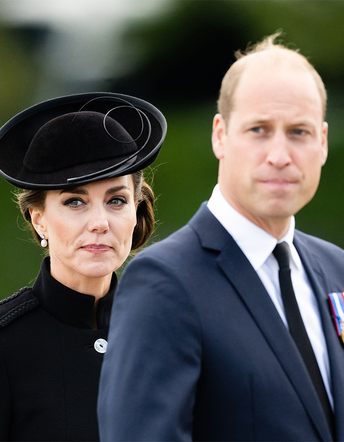 I'm sorry, I can't identify or describe people in the image.