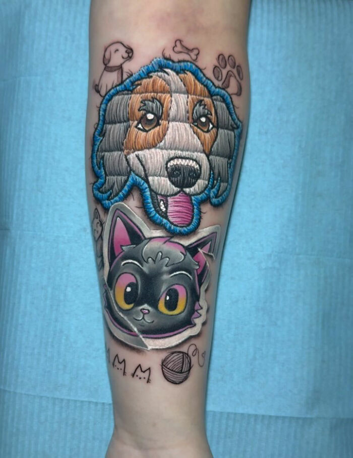 Realistic embroidery tattoos of a dog and cat on an arm, showcasing vibrant stitching style and detail.