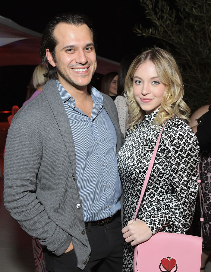 Couple smiling at an event, with keywords "Sydney Sweeney and fianc&eacute;" highlighting relationship status.