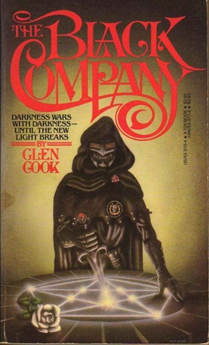 'the Black Company', By Glen Cook. Works As A Standalone, Ended Up Spawning An Excellent Series. High Fantasy Told From The POV Of Front-Line Mercenary Grunts, Instead Of The Powerful Movers And Shakers. Recommended!