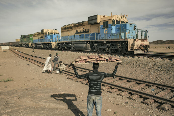 Mauritanian Iron Ore Train Arrives In The Town Of Choum, Around Halfway Between Nouadhibou And The Mines Of Zouerat