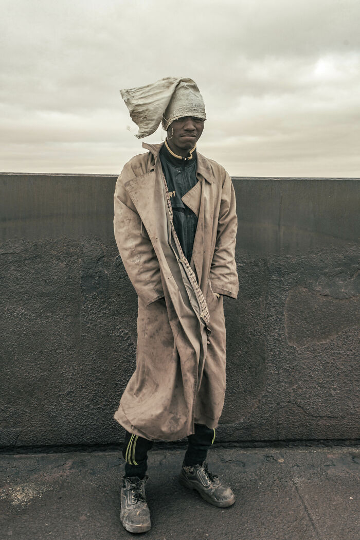 One Of The Workers Traveling On The Mauritanian Iron Ore Train