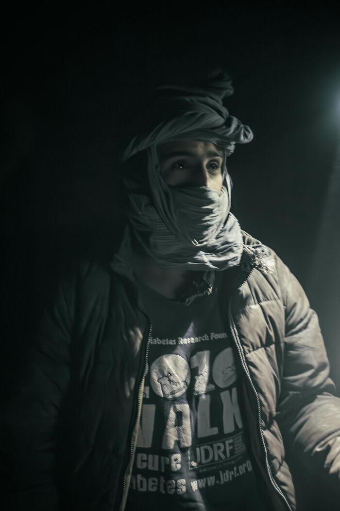 Portrait Of A Mauritanian Worker Inside The Cargo Carriage Of The Iron Ore Train