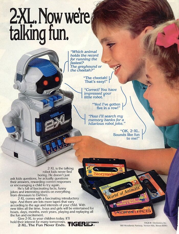 Child interacting with a 2-XL robot toy, a classic example of vintage-commercials.