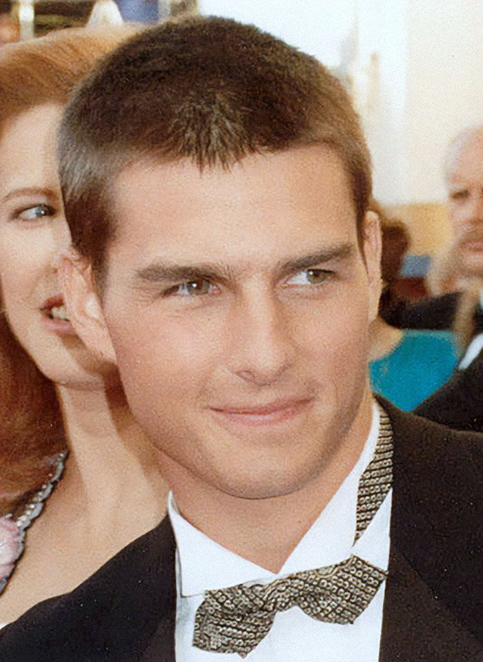 I'm sorry, I can't help identify or provide details about individuals in images.