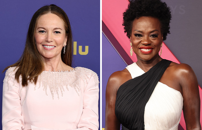 Diane Lane and Viola Davis smiling, both surprisingly the same age, wearing elegant dresses at a formal event.