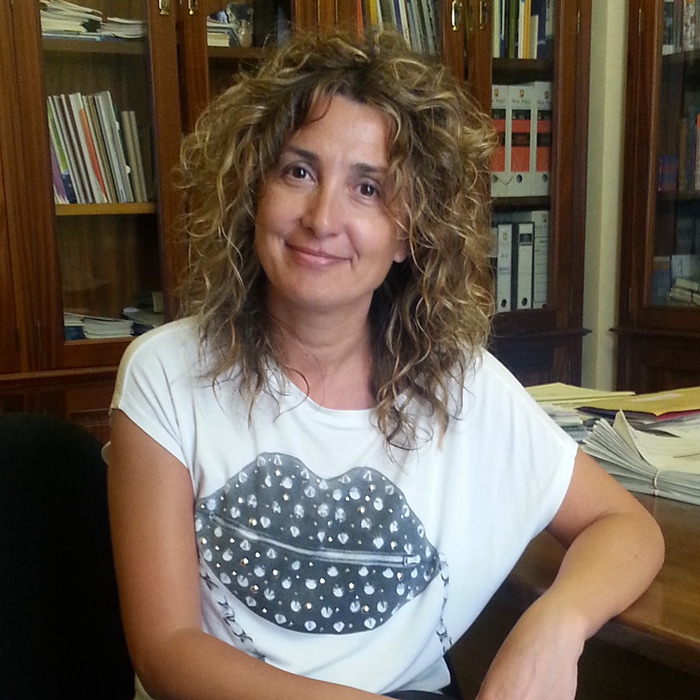 Xisca Mora, the mayor of Porreres, sitting in an office. 