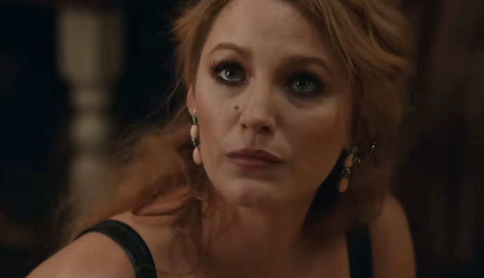 A woman with long hair, wearing earrings, looking upwards; associated with difficult actors.