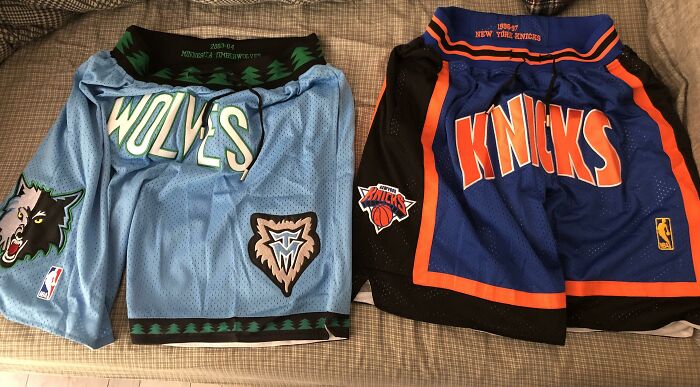 Basketball shorts from Wolves and Knicks teams laid out, symbolizing love through thoughtful gifts.