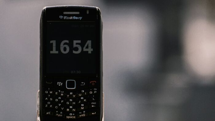 BlackBerry phone displaying the time, related to "songs as ringtones" nostalgia.