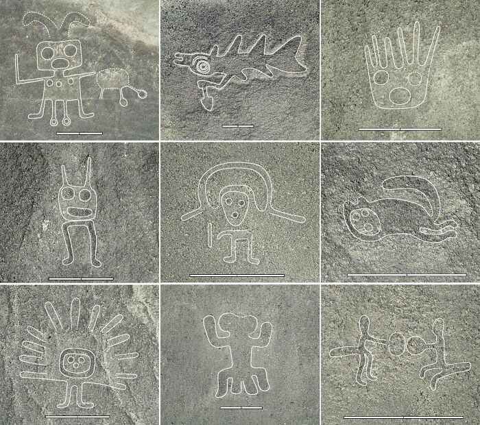 Ancient civilizations artifacts: various petroglyphs etched into a gray stone surface.