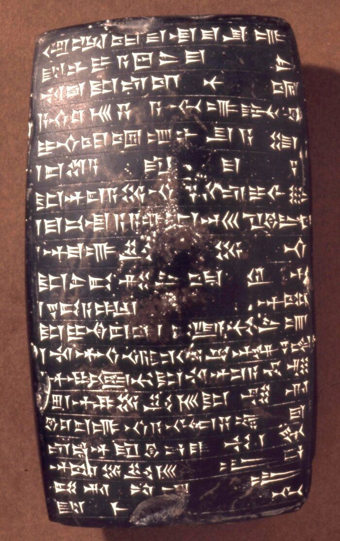 Ancient artifacts: A clay tablet with cuneiform script, offering insight into ancient civilizations.