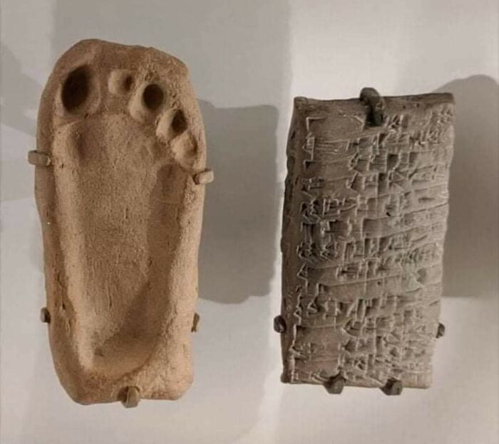 Ancient artifacts including a clay footprint and a cuneiform tablet, revealing glimpses into early civilizations.