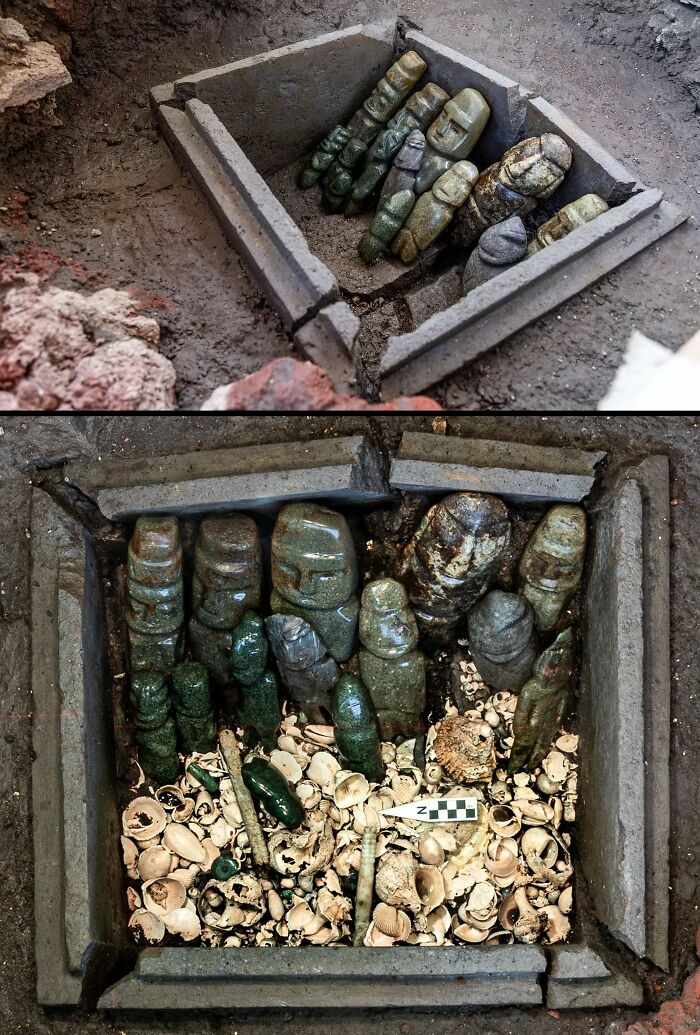 Ancient artifacts in a rectangular box, featuring carved stone figures and shells, offering a glimpse into ancient civilizations.