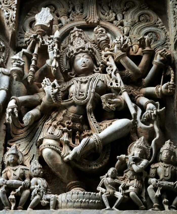 Intricate stone carving depicting a deity, showcasing fascinating artifacts of ancient civilizations.