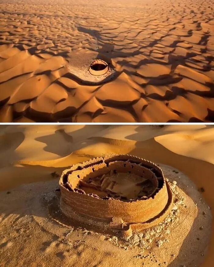 Ancient civilizations artifact partially buried in desert sands, showcasing historical remnants.