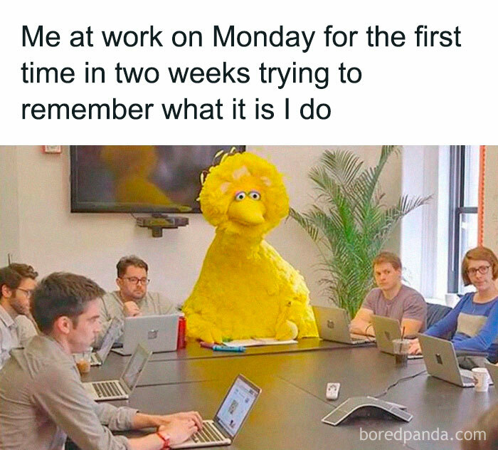 Big yellow bird at a meeting table with workers, capturing a funny and relatable workforce moment.